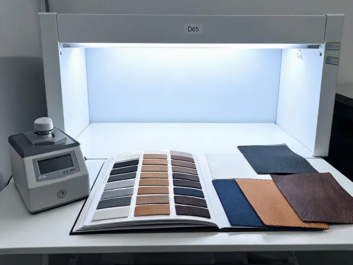 Color standards beside textured textile swatches